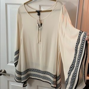 Beautiful cream blouse with wide sleeves